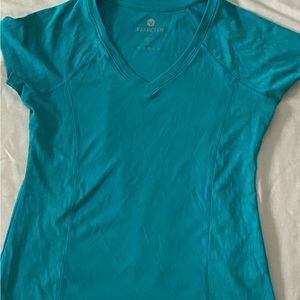 Gently used Women’s size medium Velocity workout tee.